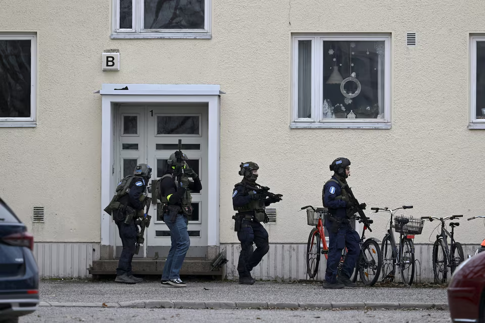 Police officers operate at the Viertola comprehensive school in Vantaa, Finland, on April 2, 2024. Three minors were injured in a shooting at the school on Tuesday morning. A suspect, also a minor, has been apprehended. Lehtikuva/Markku Ulander via Reuters