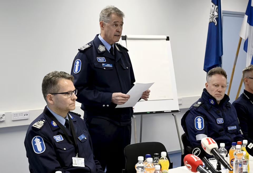 National Police Commissioner Seppo Kolehmainen speaks while Police Chief Ilkka Koskimaki and Inspector Tomi Salosyrja look on during a police press conference on the Viertola school shooting incident in Vantaa, Finland, on April 2, 2024. One sixth grade pupil died and two others were seriously injured in the Vantaa school shooting on Tuesday. Lehtikuva/Markku Ulander via Reuters