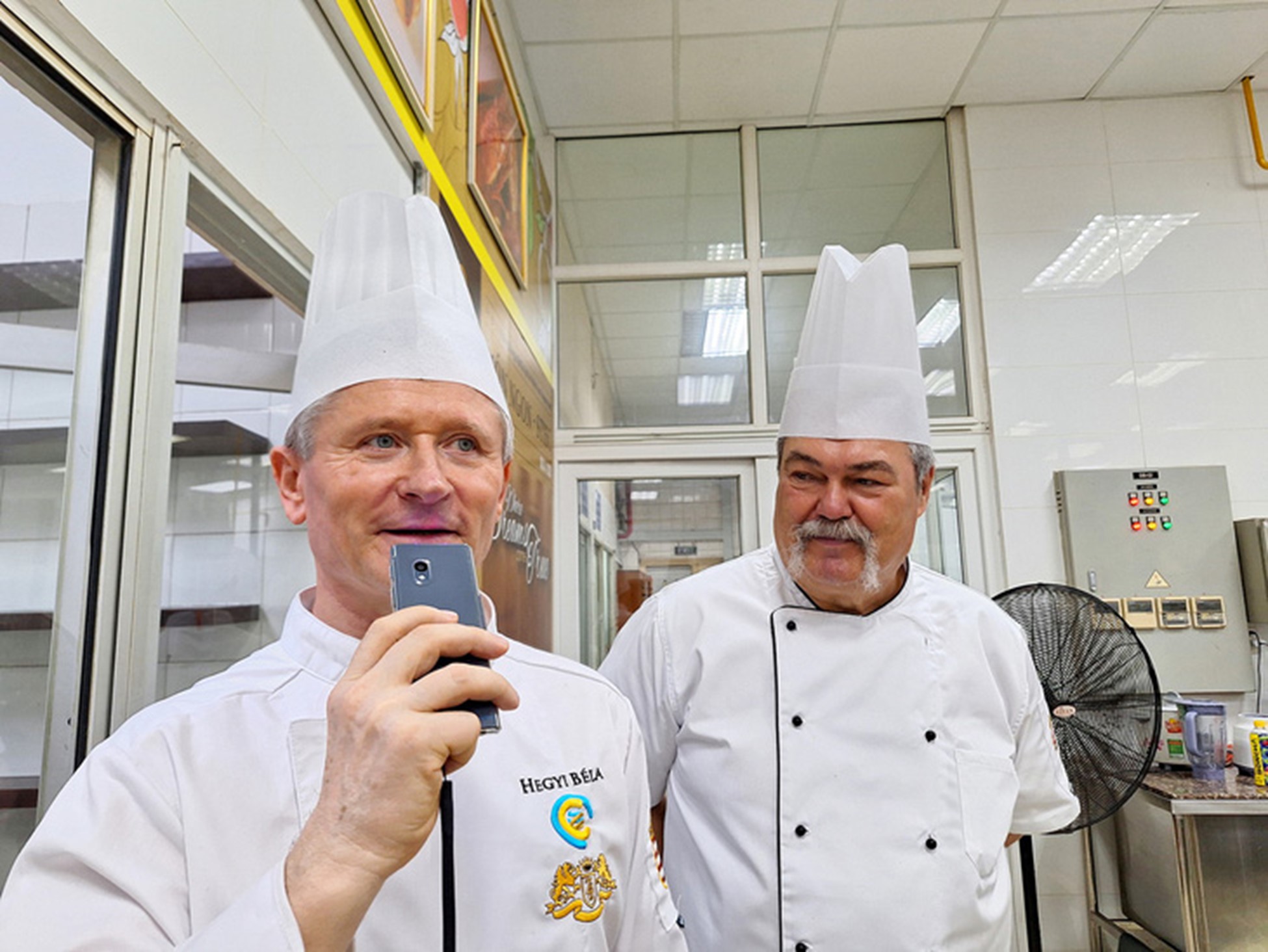 Hegyi Béla (left) and Horváth Ferenc, two Hungarian teachers in a training session at the Saigontourist Hospitability College in Ho Chi Minh City, southern Vietnam. Photo: Trong Nhan / Tuoi Tre