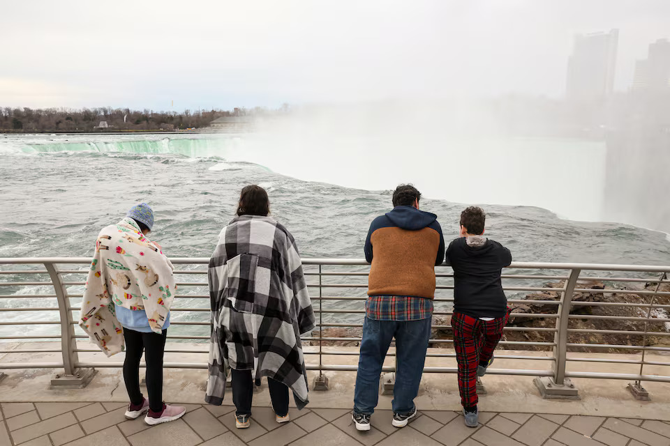 Tourists look at the Horseshoe Falls, ahead of the Solar Eclipse that will take place across parts of the United States and Canada, at Niagara Falls, New York, U.S., April 8, 2024. Photo: Reuters