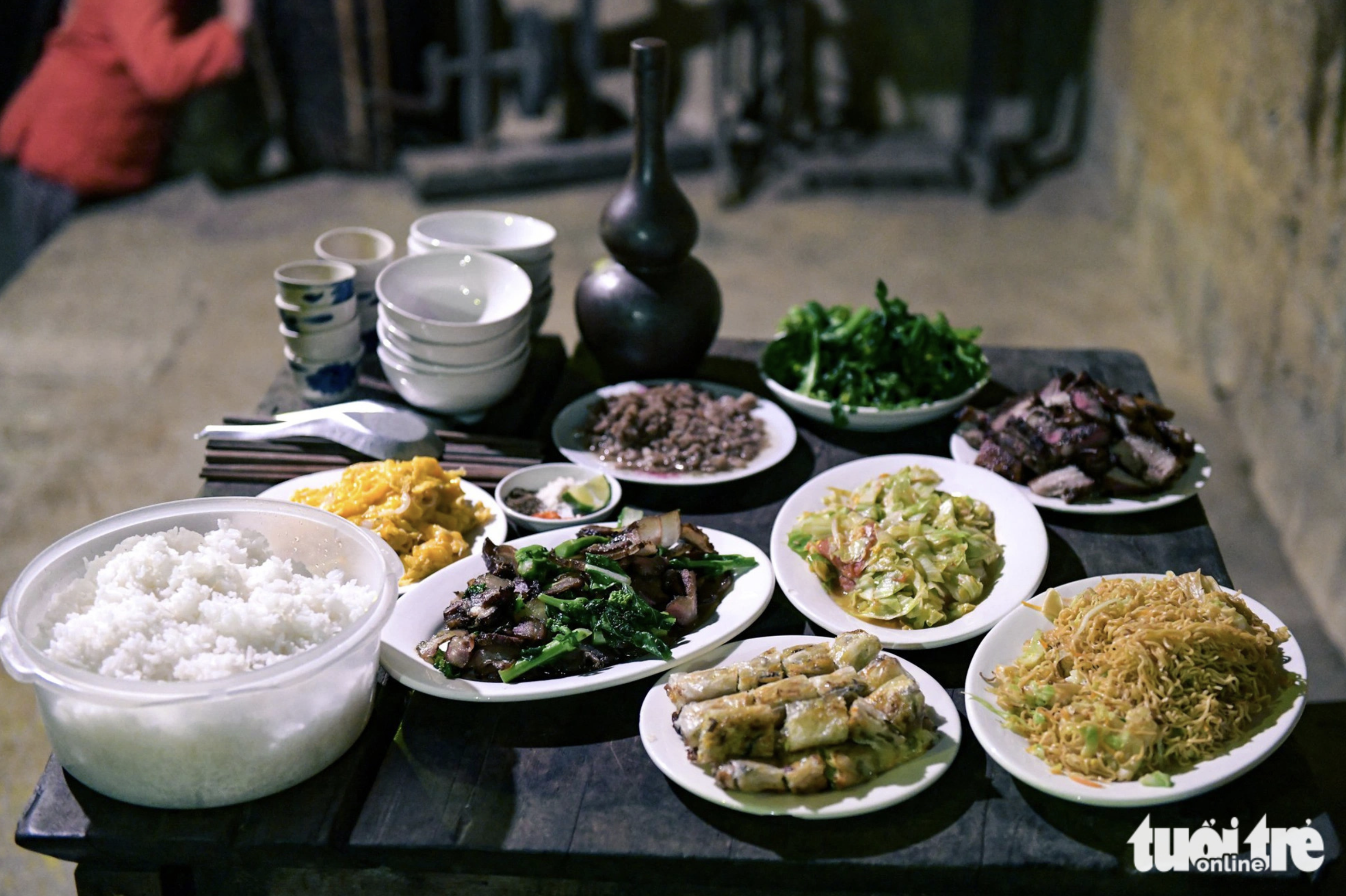 A tray of rice and specialties prepared for tourists at a homestay in Lao Xa Village in Ha Giang Province, northern Vietnam. Photo: Nam Tran / Tuoi Tre