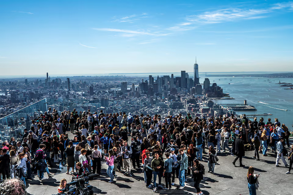 People gather on the observation deck of Edge at Hudson Yards ahead of the solar eclipse in New York City. Photo: Reuters