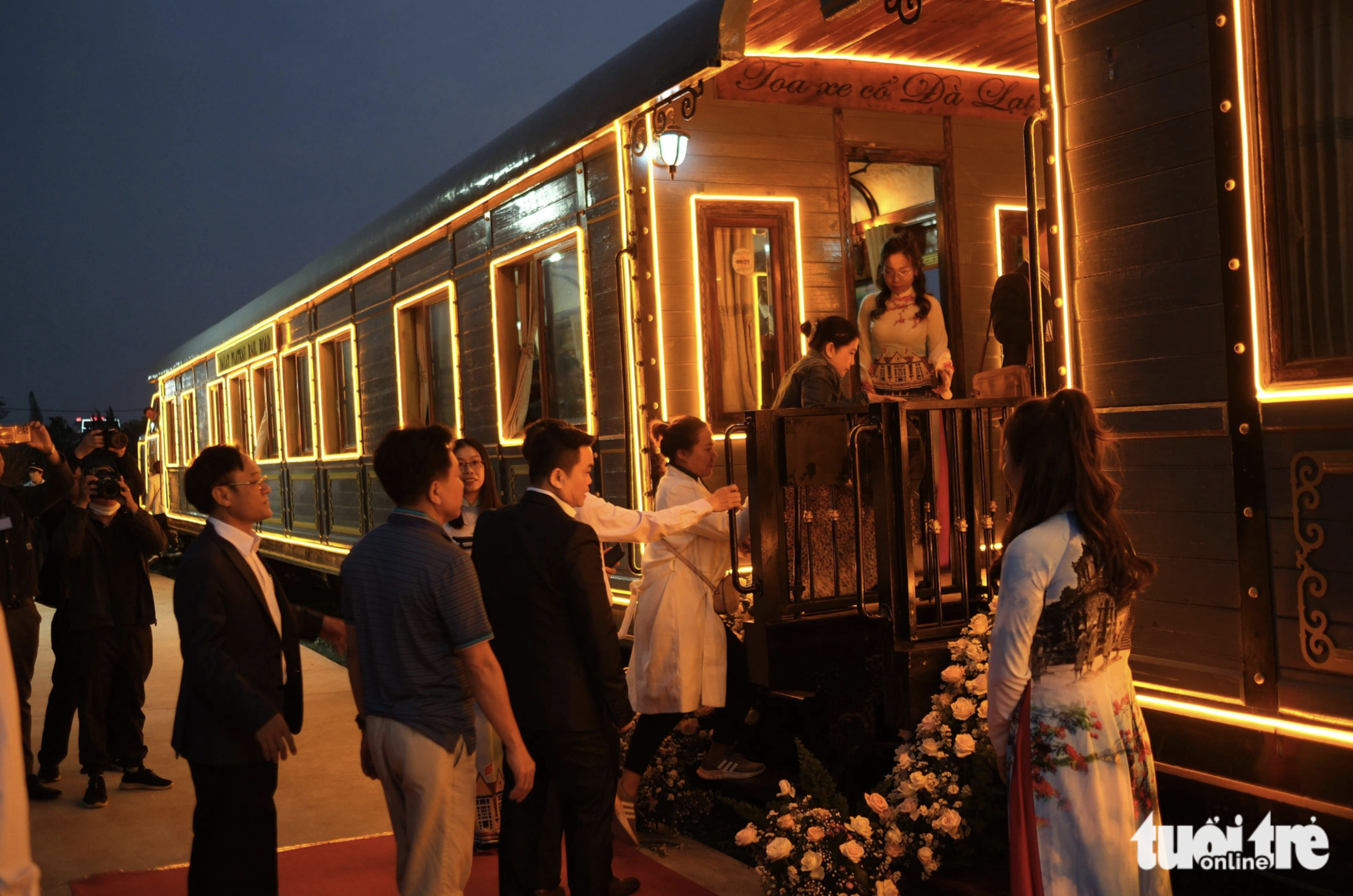 Tourists embark on a vintage train to start their romanticized Da Lat - Trai Mat night journey in Da Lat City, Lam Dong Province. Photo: M. V. / Tuoi Tre