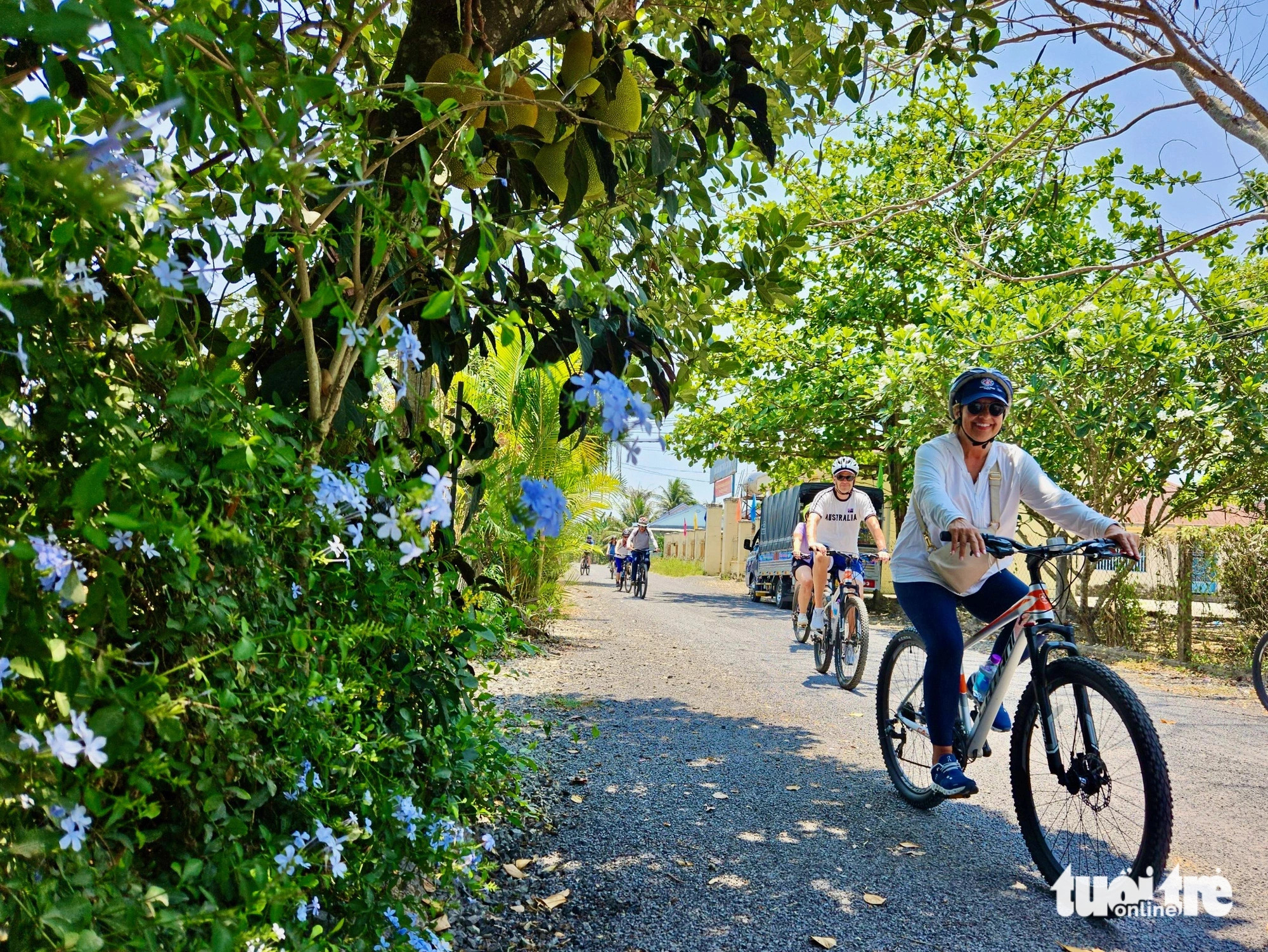 International travelers are seen on their bicycle tour of countryside in Nha Trang City, Khanh Hoa Province, south-central Vietnam. Photo: Minh Chien / Tuoi Tre