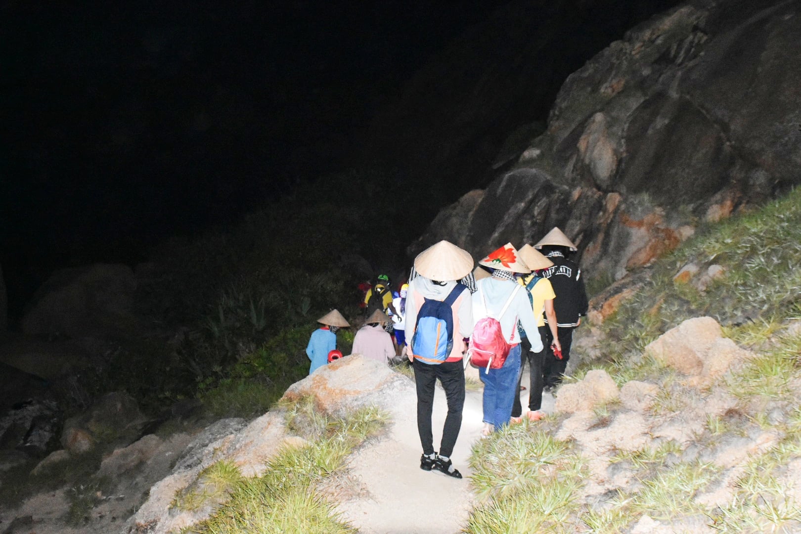 A group of tourists depart at Rang beach at four in the morning to reach Doi Cape for the sunrise. Photo: Tran Hoai