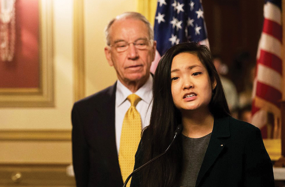 Amanda Nguyen, founder of Rise, a sexual assault survivor rights nonprofit group, speaks at the Capitol in Washington. Photo: Elle Magazine
