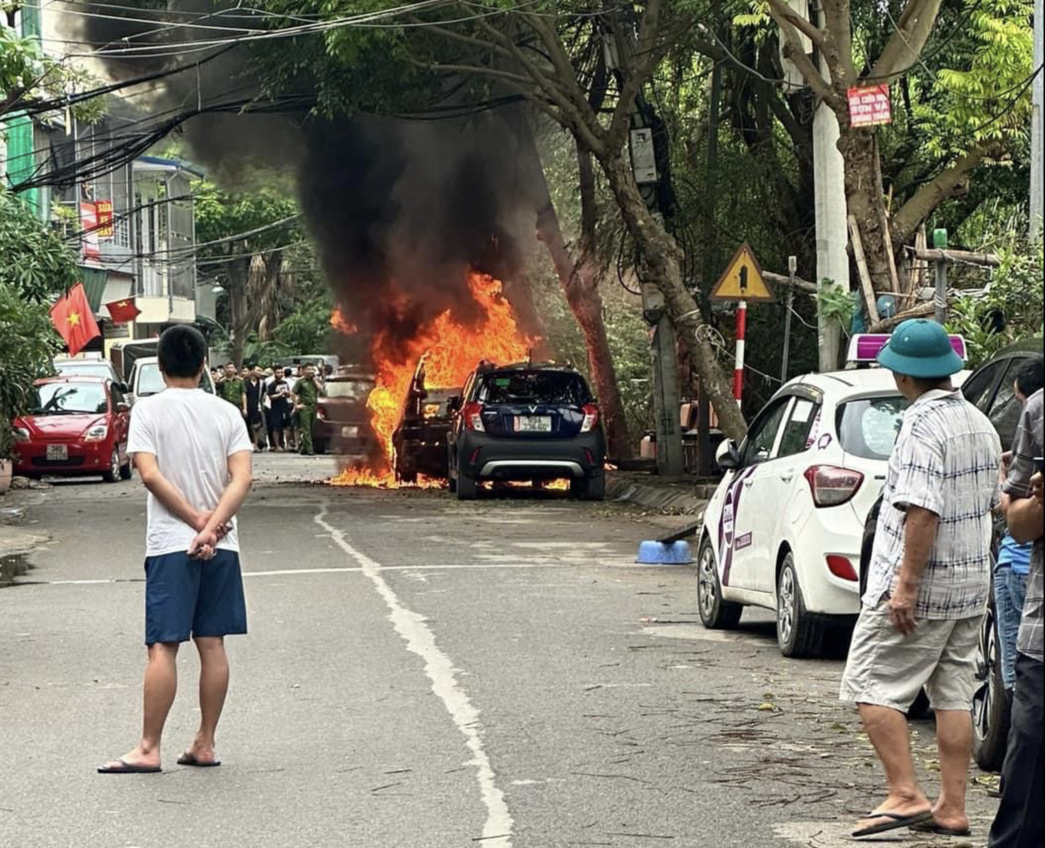 BMW car engulfed in flames in Hanoi