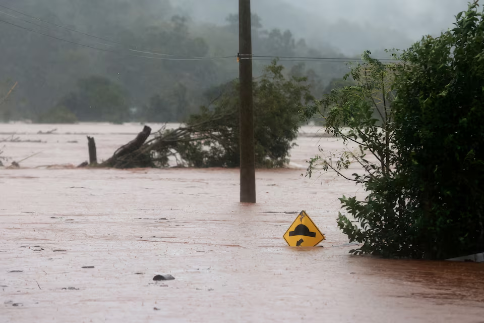 A flooded road is seen near the Taquari River during heavy rains in the city of Encantado in Rio Grande do Sul, Brazil, May 1, 2024. Photo: Reuters