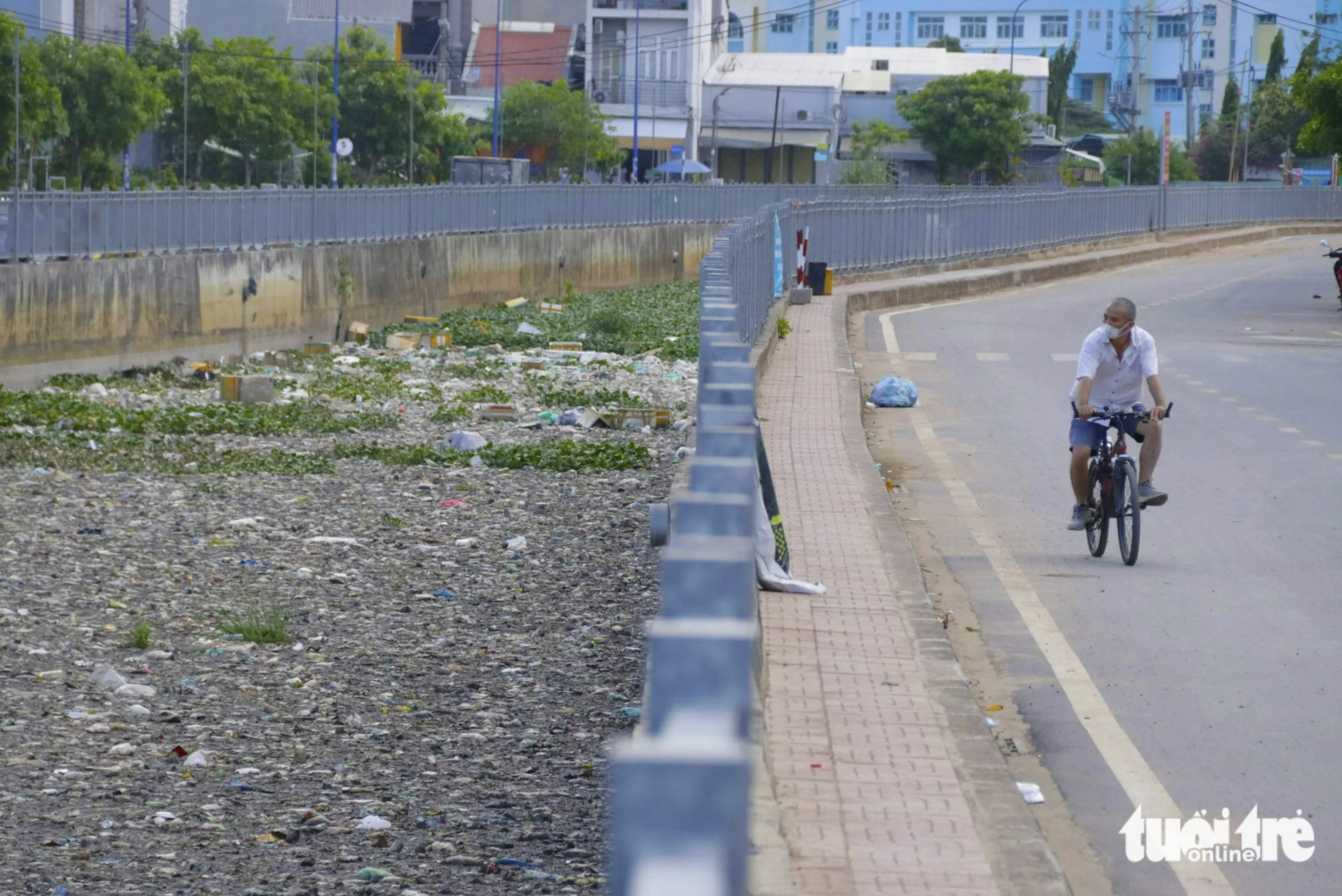 Ho Chi Minh City canal swamped with garbage
