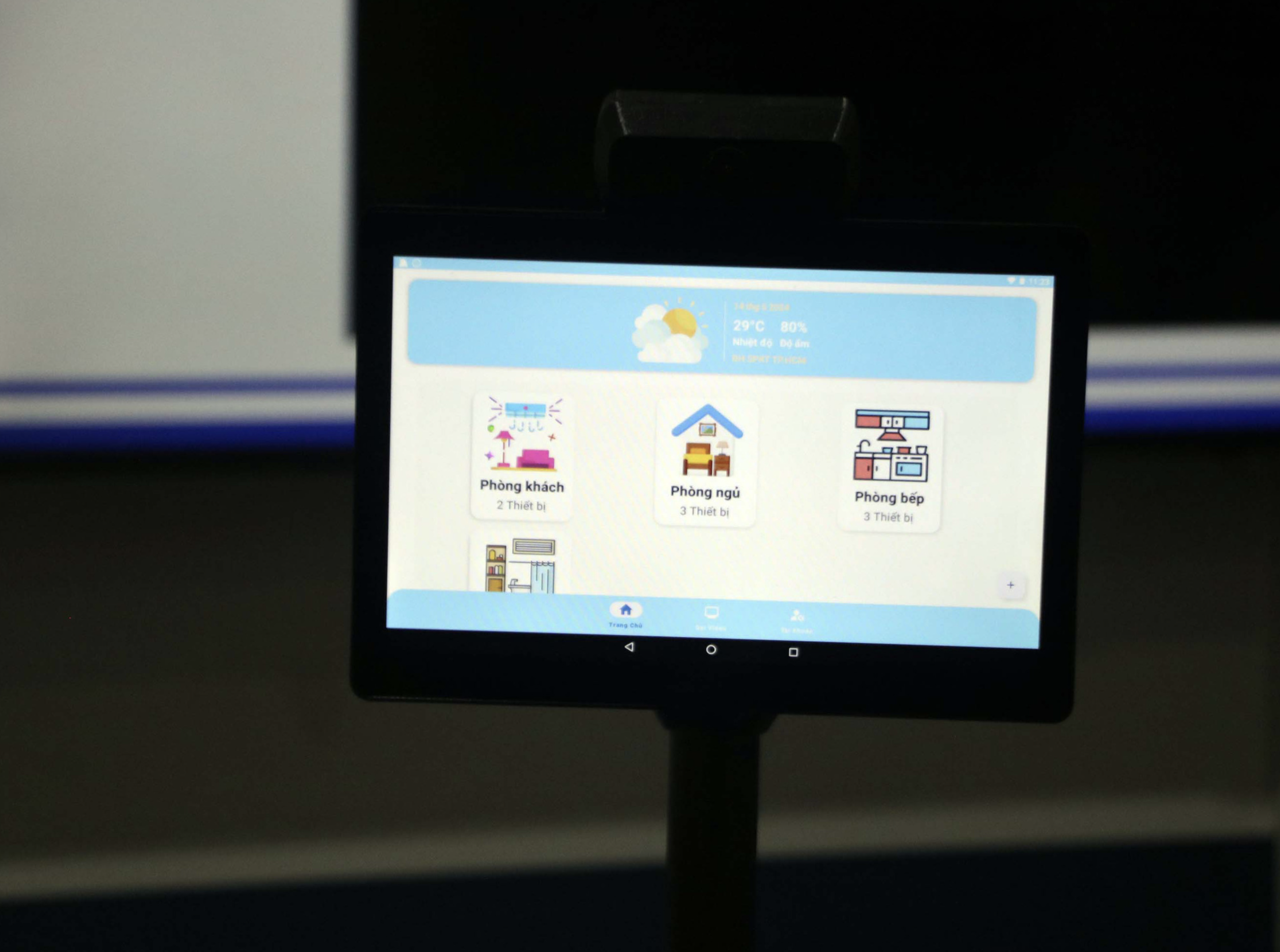 A touch screen on a robot for elderly assistance shows some functions. Photo: Trong Nhan / Tuoi Tre