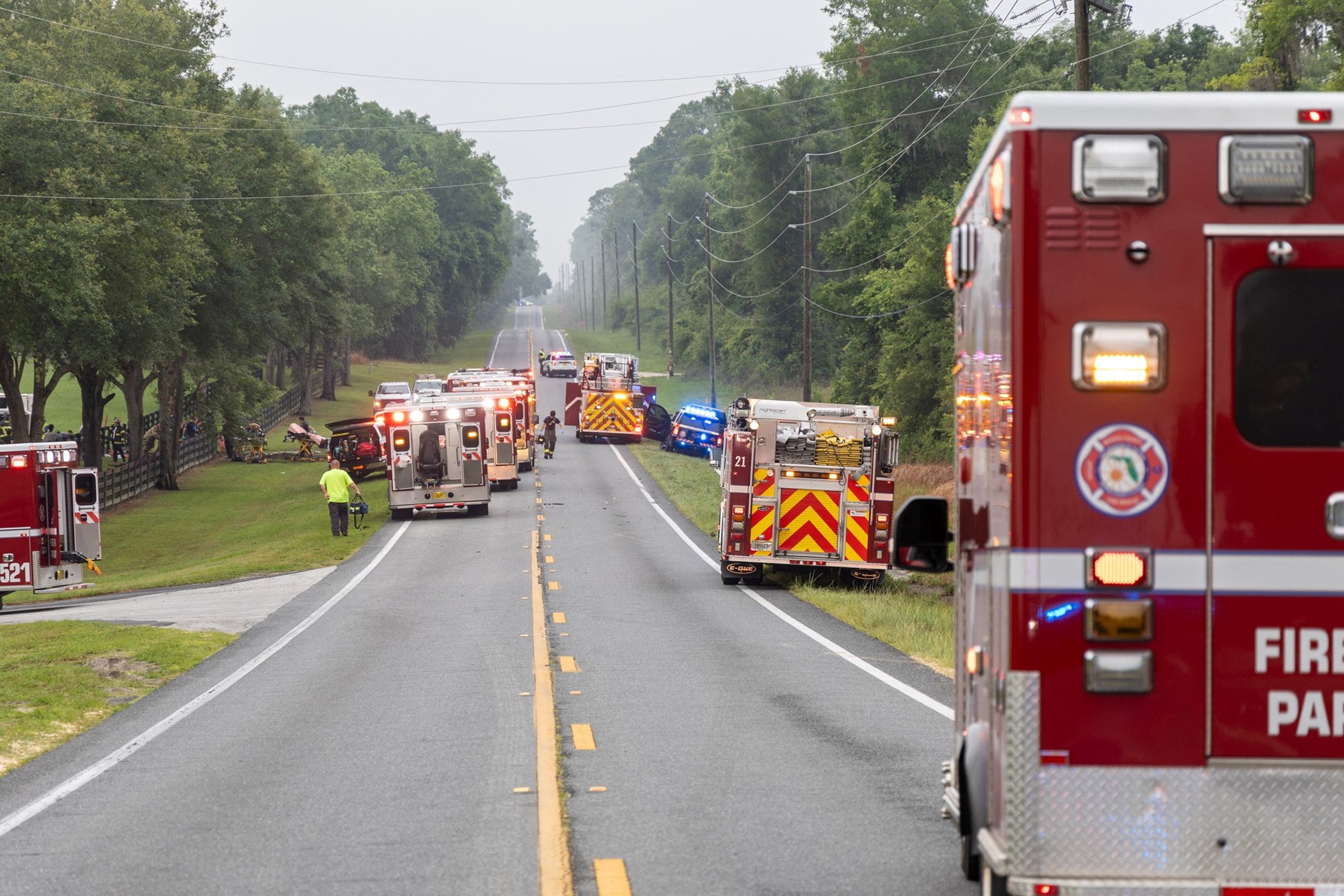 Fire rescue unit workers attend the scene after a bus carrying laborers to a melon farm overturned in a fatal crash near Dunnellon, Marion County, Florida, U.S. in this handout picture released on May 14, 2024. Photo: Reuters