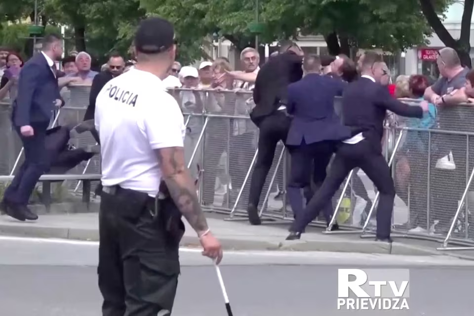 Members of Slovakia's Prime Minister Robert Fico's security detain a man during a shooting incident when Fico was approaching people after a Slovak government meeting in Handlova, Slovakia, May 15, 2024 in this screen grab from a video. RTV PRIEVIDZA/Handout via Reuters