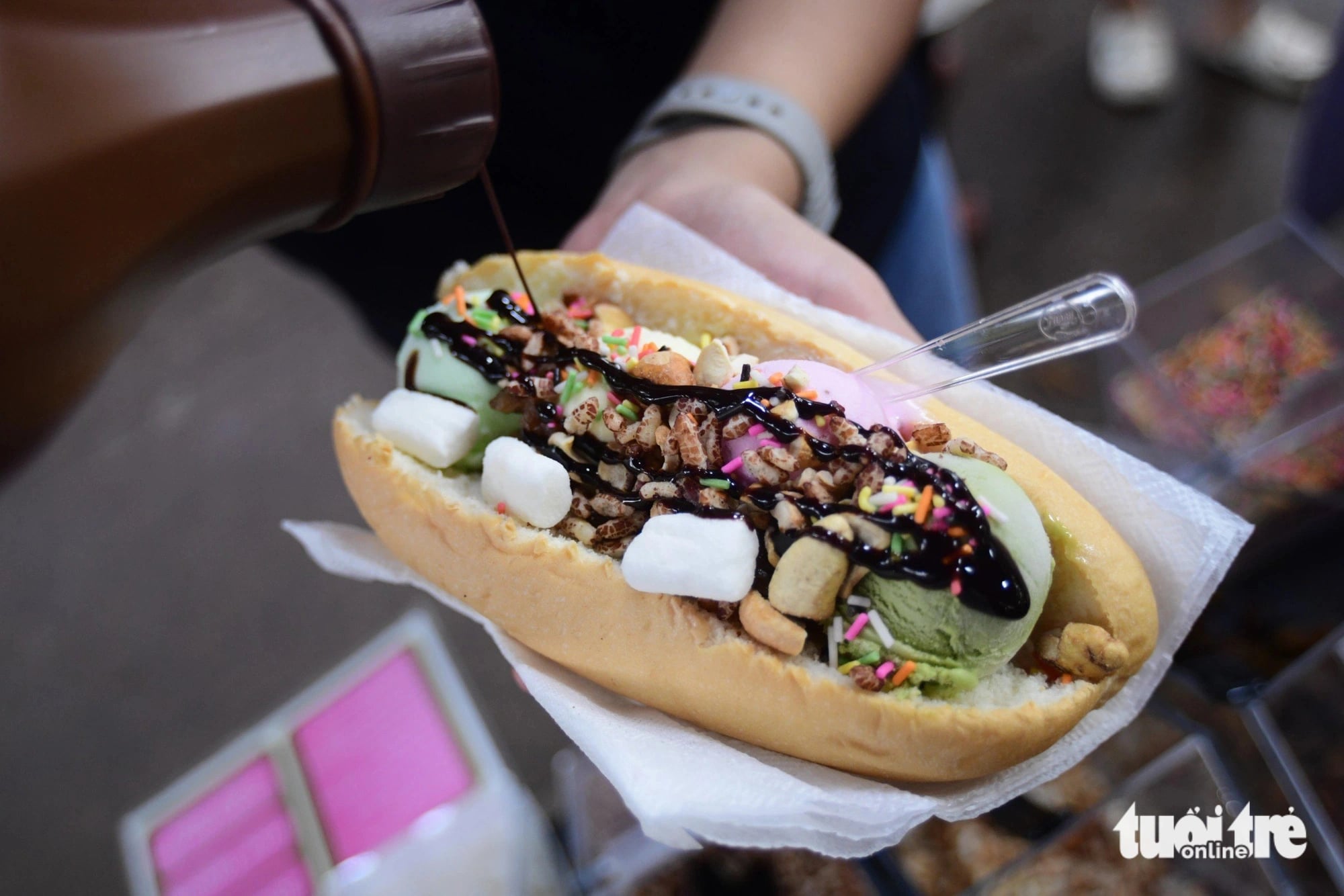 A loaf of soft bread filled with ice cream at the Vietnam Banh Mi Festival at Le Van Tam Park in District 1, Ho Chi Minh City on May 17. Photo: Quang Dinh / Tuoi Tre