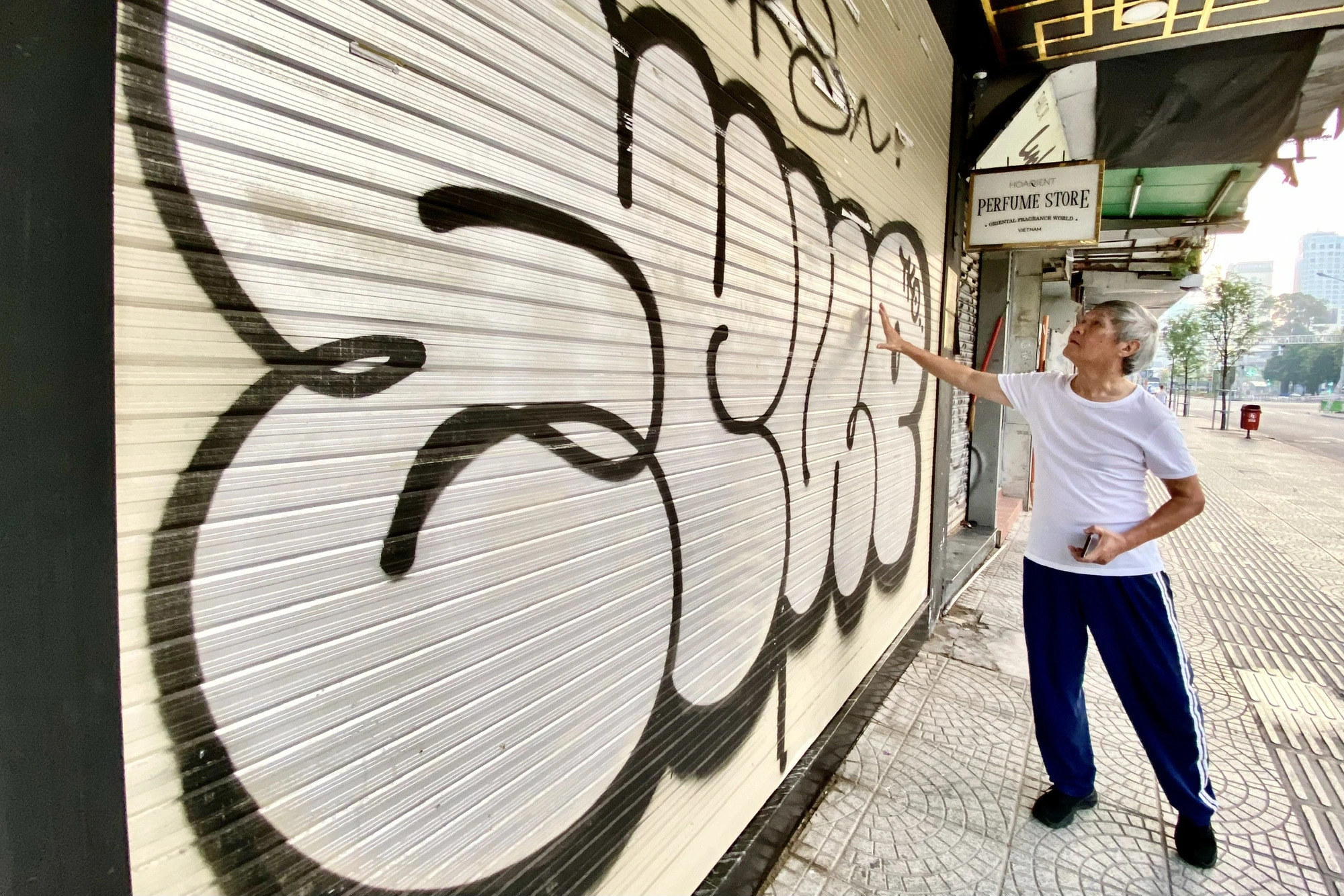 The biggest graffiti piece along the street is possibly more than one meter long. Photo: Tien Quoc / Tuoi Tre