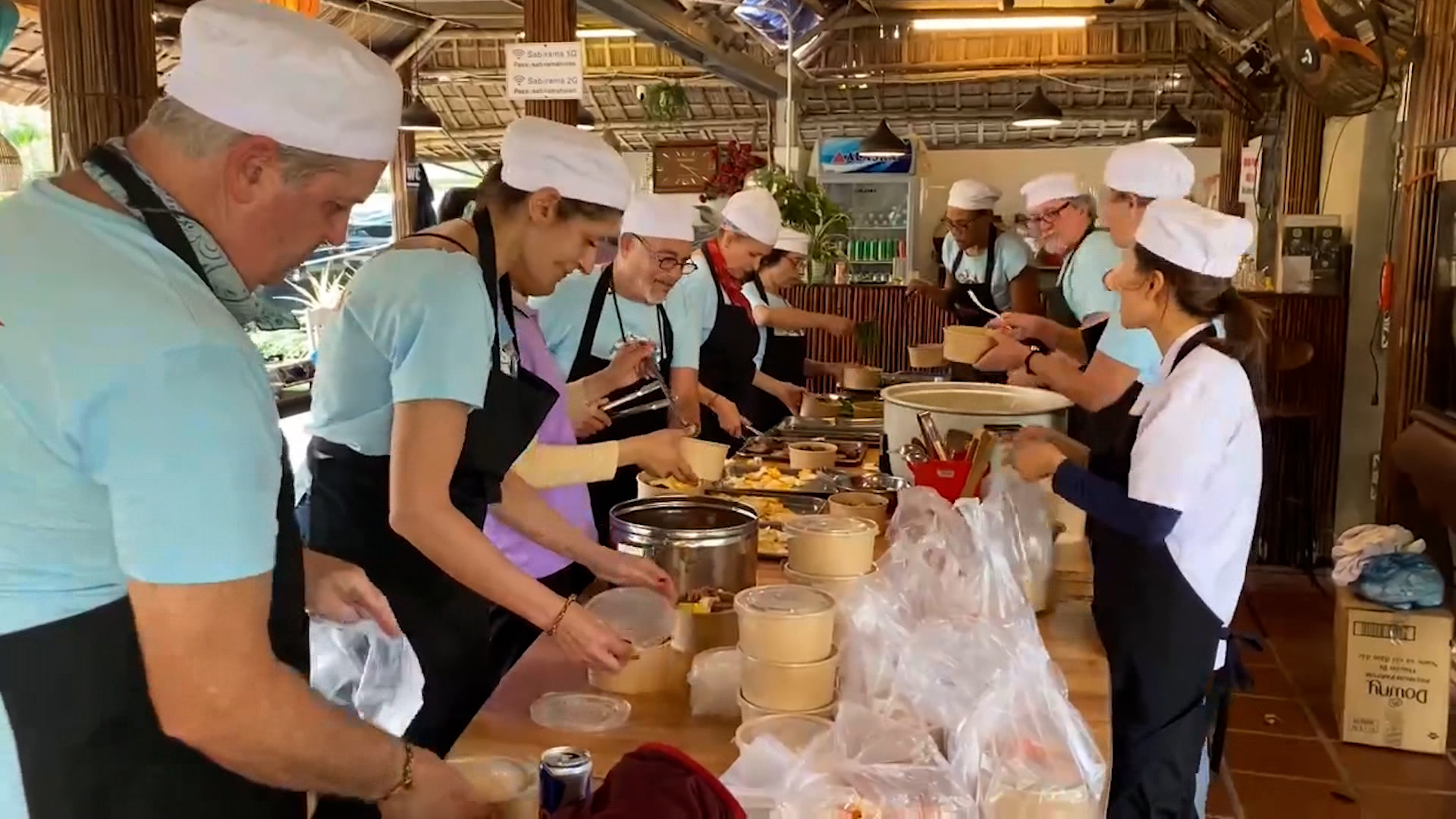 Foreigners cook Vietnamese meals for needy locals