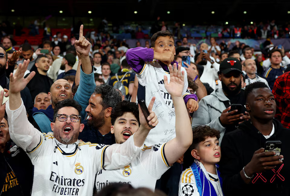 Soccer Football - Champions League - Final - Borussia Dortmund v Real Madrid - Wembley Stadium, London, Britain - June 1, 2024 Real Madrid fans celebrates after winning the Champions League. Photo: Reuters