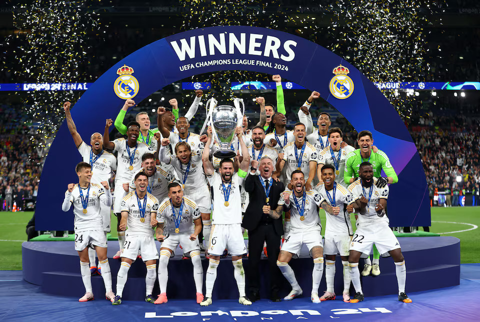 Soccer Football - Champions League - Final - Borussia Dortmund v Real Madrid - Wembley Stadium, London, Britain - June 1, 2024 Real Madrid's Nacho lifts the trophy as they celebrate winning the Champions League. Photo: Reuters