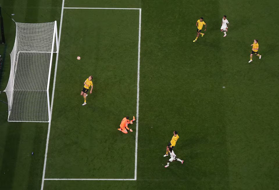 Soccer Football - Champions League - Final - Borussia Dortmund v Real Madrid - Wembley Stadium, London, Britain - June 1, 2024 Real Madrid's Vinicius Junior scores their second goal. Photo: Reuters