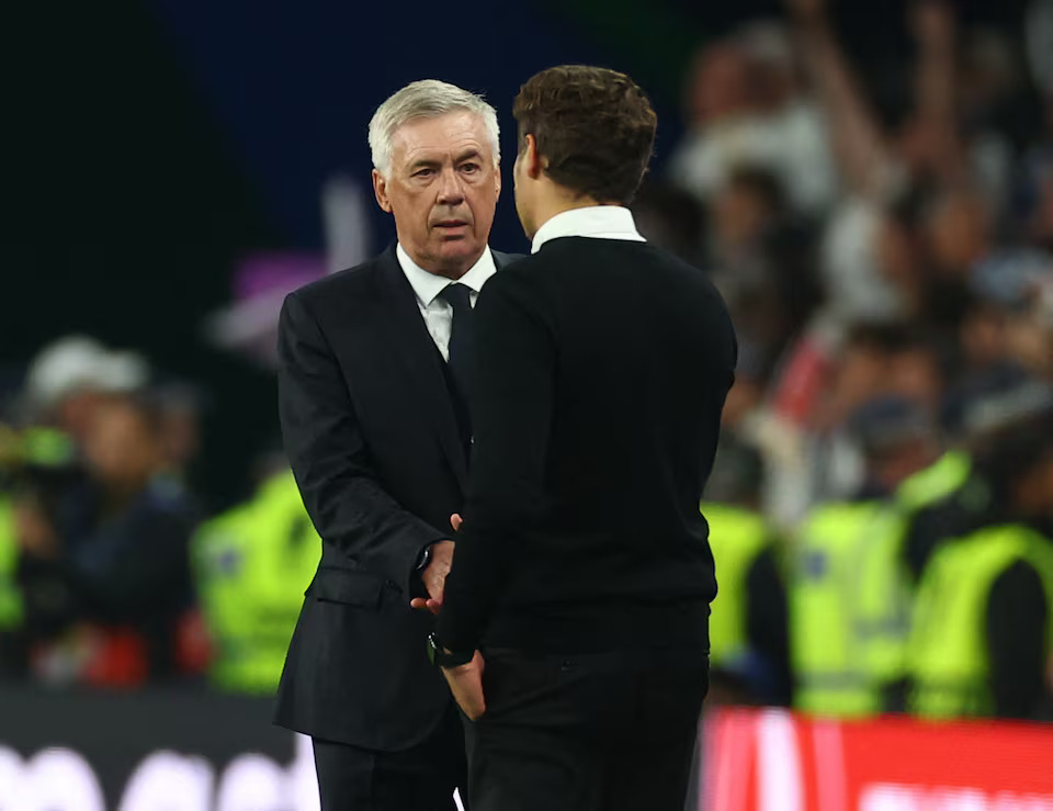 Soccer Football - Champions League - Final - Borussia Dortmund v Real Madrid - Wembley Stadium, London, Britain - June 1, 2024 Real Madrid coach Carlo Ancelotti shakes hands with Borussia Dortmund coach Edin Terzic at the end of the match. Photo: Reuters