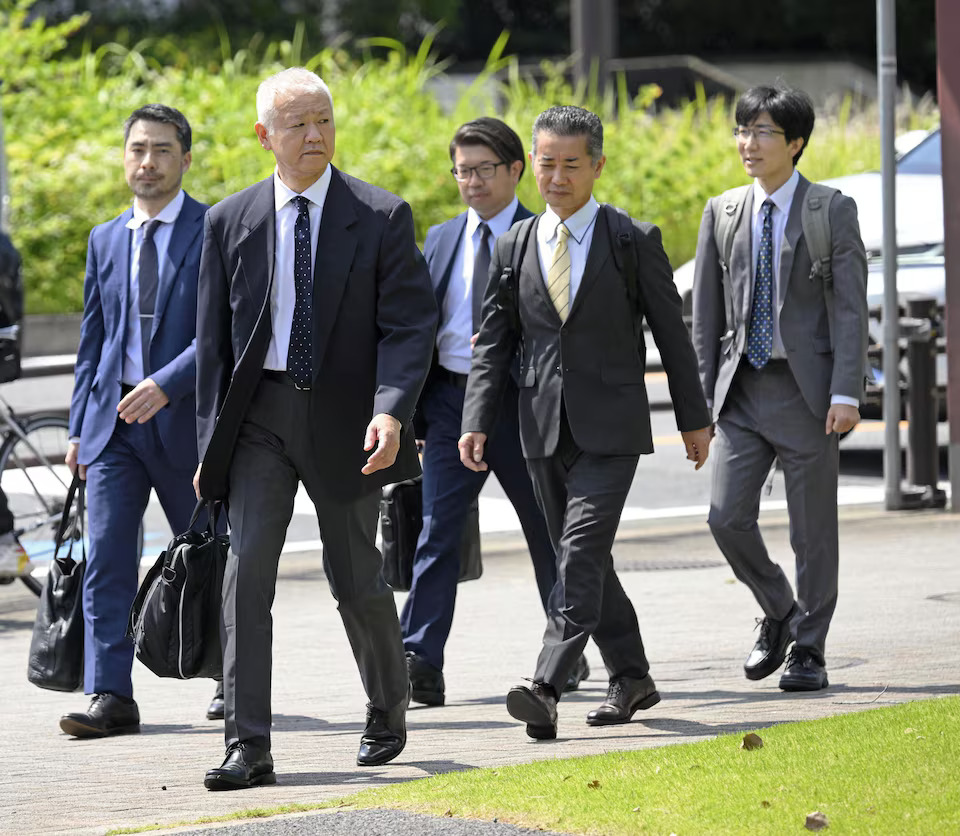 Japanese transport ministry officials head to Toyota Motor Corp.'s headquarters for an on-site investigation over certification irregularities in central Japan, June 4, 2024, in this photo taken by Kyodo.  Photo: Reuters