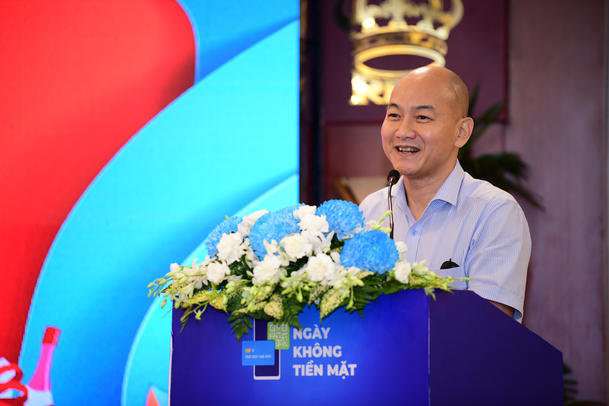 Nguyen Nguyen Phuong, deputy director of the Ho Chi Minh City Industry and Trade Department, speaks at the press conference for the 2024 Cashless Day (June 16) in Ho Chi Minh City, May 28, 2024. Photo: Quang Dinh / Tuoi Tre