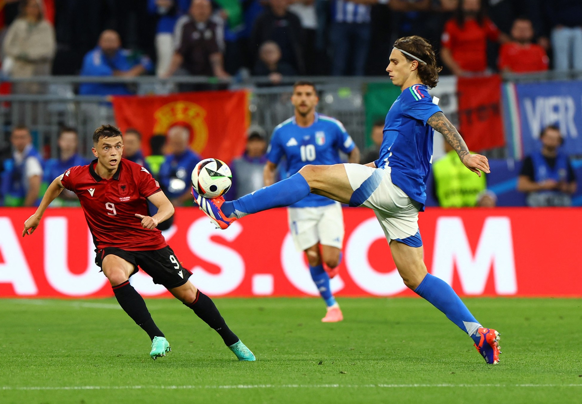 Soccer Football - Euro 2024 - Group B - Italy v Albania - Dortmund BVB Stadion, Dortmund, Germany - June 15, 2024 Albania's Jasir Asani in action with Italy's Riccardo Calafiori.  Photo: Reuters