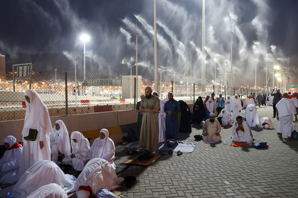 [7/42]Muslim pilgrims pray, on the first day of the Satan stoning ritual, during the annual haj pilgrimage, in Mina, Saudi Arabia, June 16. REUTERS/Saleh Salem Purchase Licensing Rights