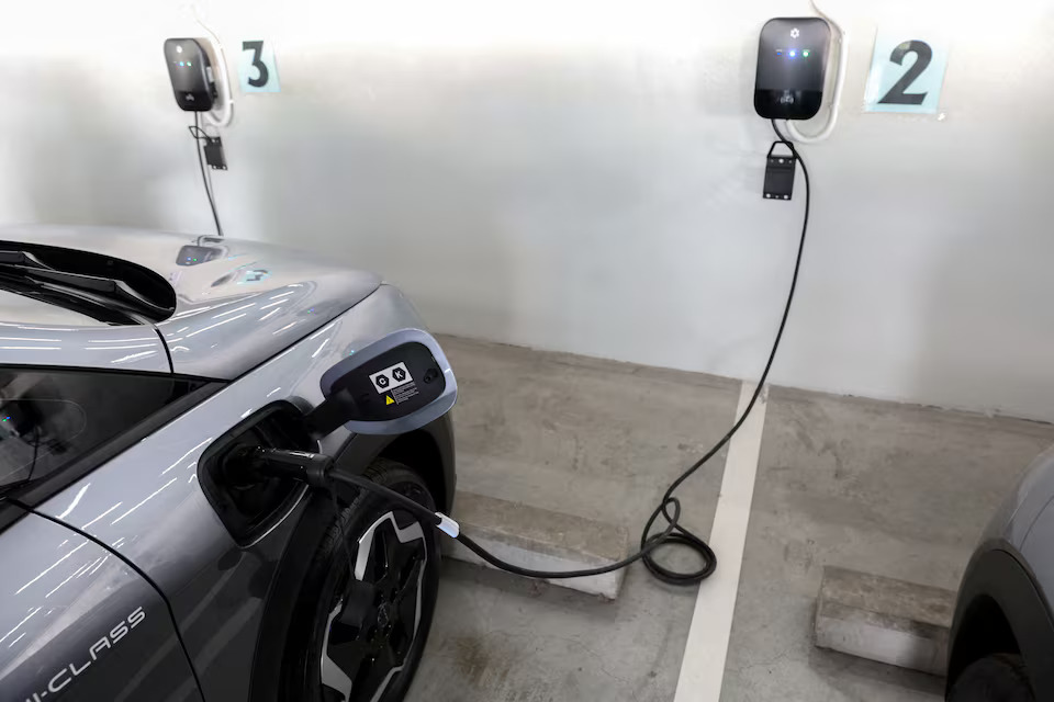 A BYD Dolphin EV car is charged at a BYD show room in Bangkok, Thailand, January 17, 2024. Photo: Reuters