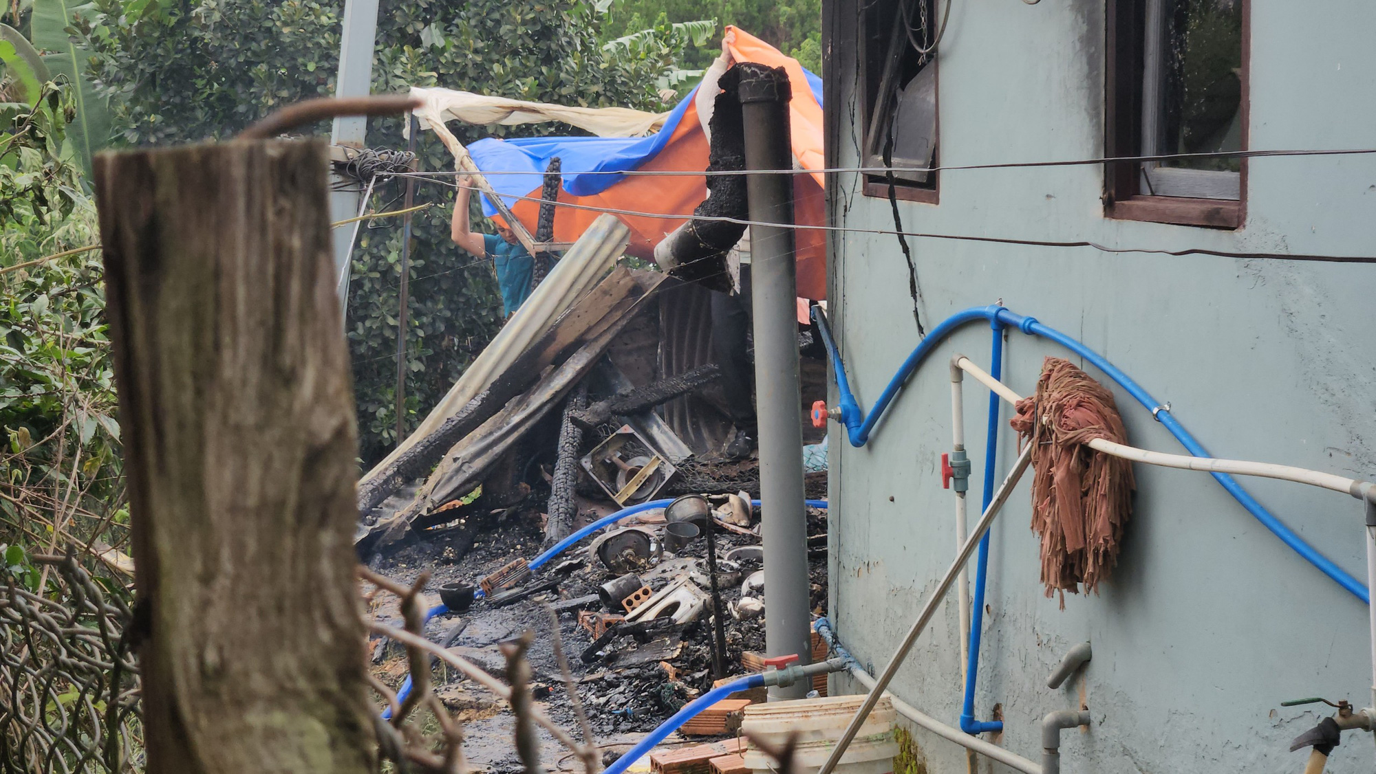 The scene of a house fire that claimed three children on Nguyen Phi Y Lan Street in Ward 7, Da Lat City, Lam Dong Province, Vietnam. Photo: M.V. / Tuoi Tre