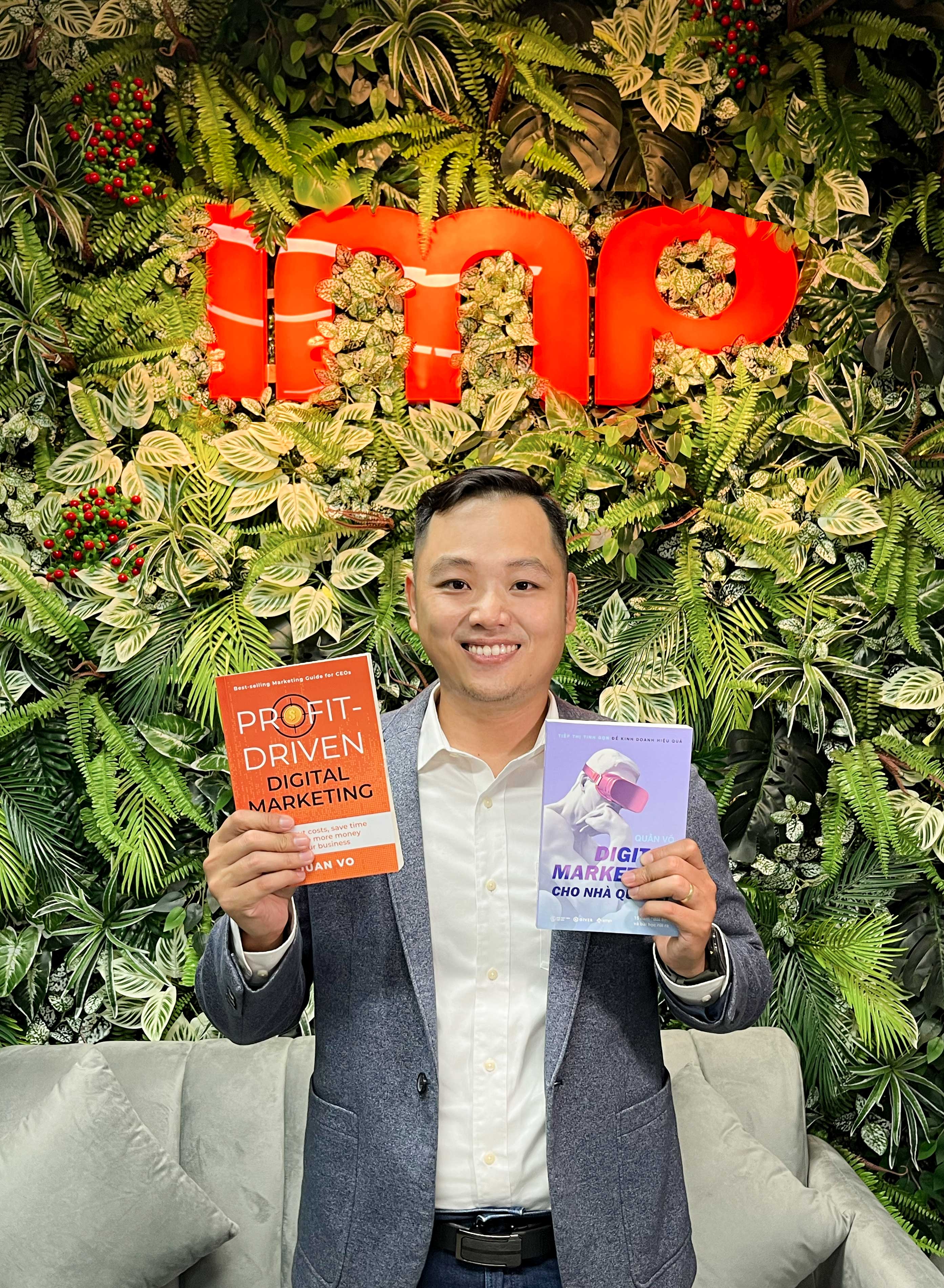 Quan Vo poses with his books in this supplied photo.