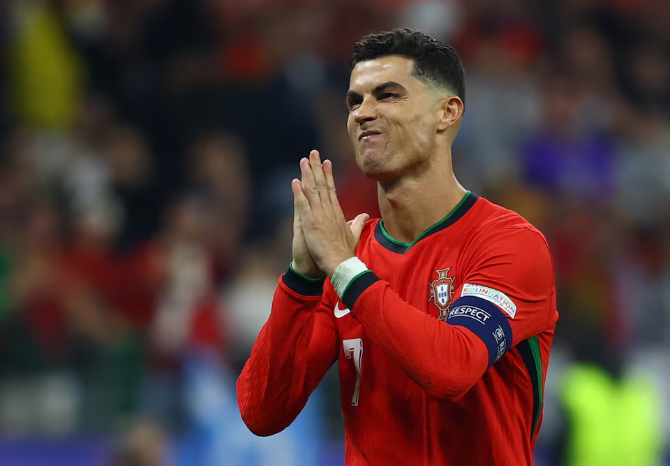 Soccer Football - Euro 2024 - Round of 16 - Portugal v Slovenia - Frankfurt Arena, Frankfurt, Germany - July 1, 2024 Portugal's Cristiano Ronaldo celebrates after he scores a penalty during the shoot-out. Photo: Reuters