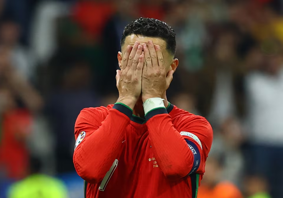 Soccer Football - Euro 2024 - Round of 16 - Portugal v Slovenia - Frankfurt Arena, Frankfurt, Germany - July 1, 2024 Portugal's Cristiano Ronaldo looks dejected after missing a penalty kick. Photo: Reuters