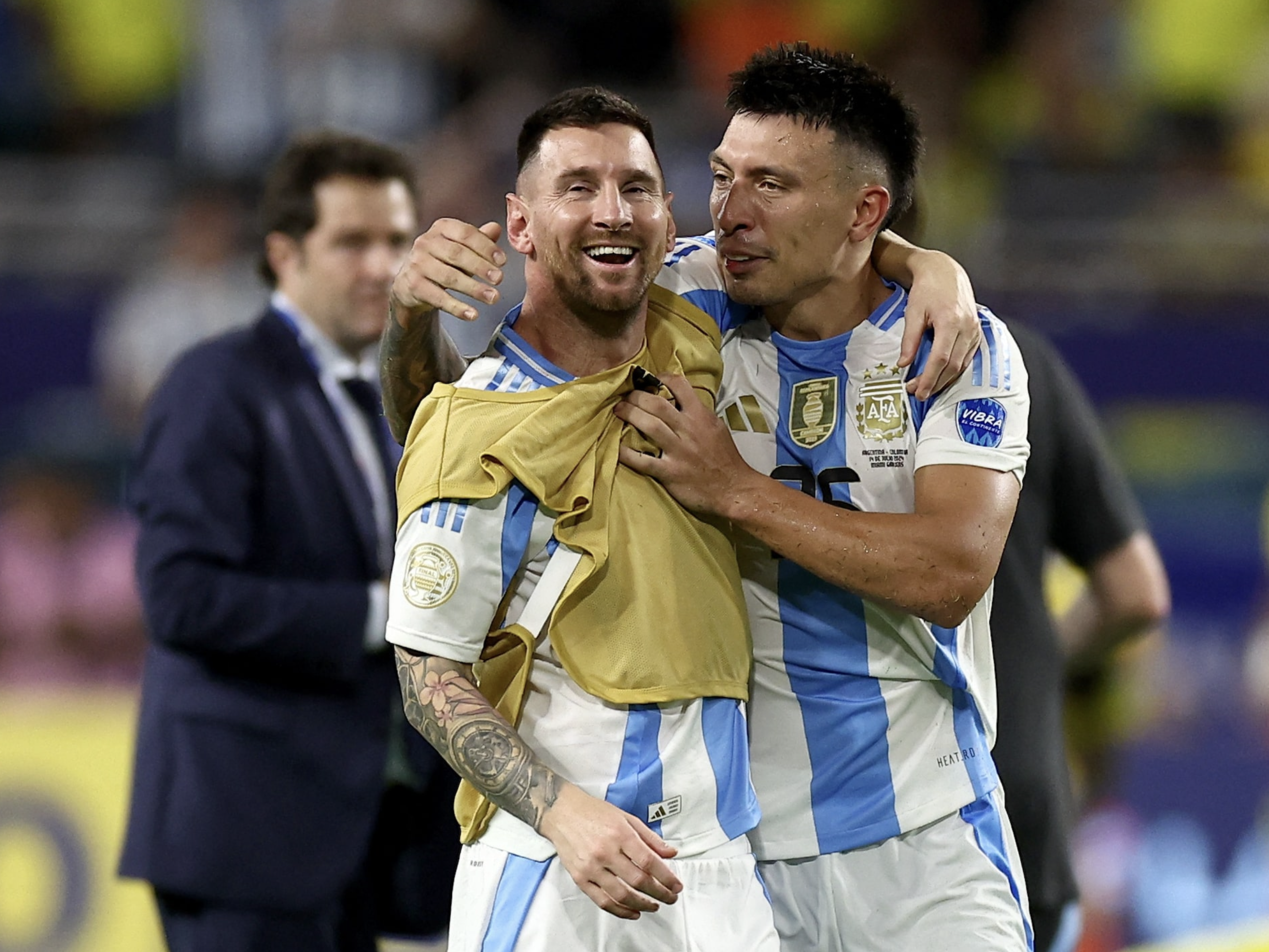 Soccer Football - Copa America 2024 - Final - Argentina v Colombia - Hard Rock Stadium, Miami, Florida, United States - July 15, 2024 Argentina's Lionel Messi and Lisandro Martinez celebrate after winning the final. Photo: Reuters