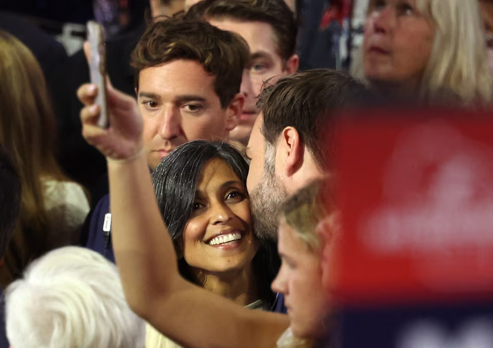 [4/16]Republican vice presidential candidate J.D. Vance is accompanied by his wife Usha Chilukuri Vance as he arrives for Day 1 of the Republican National Convention (RNC), at the Fiserv Forum in Milwaukee, Wisconsin, U.S., July 15, 2024. Photo: Reuters