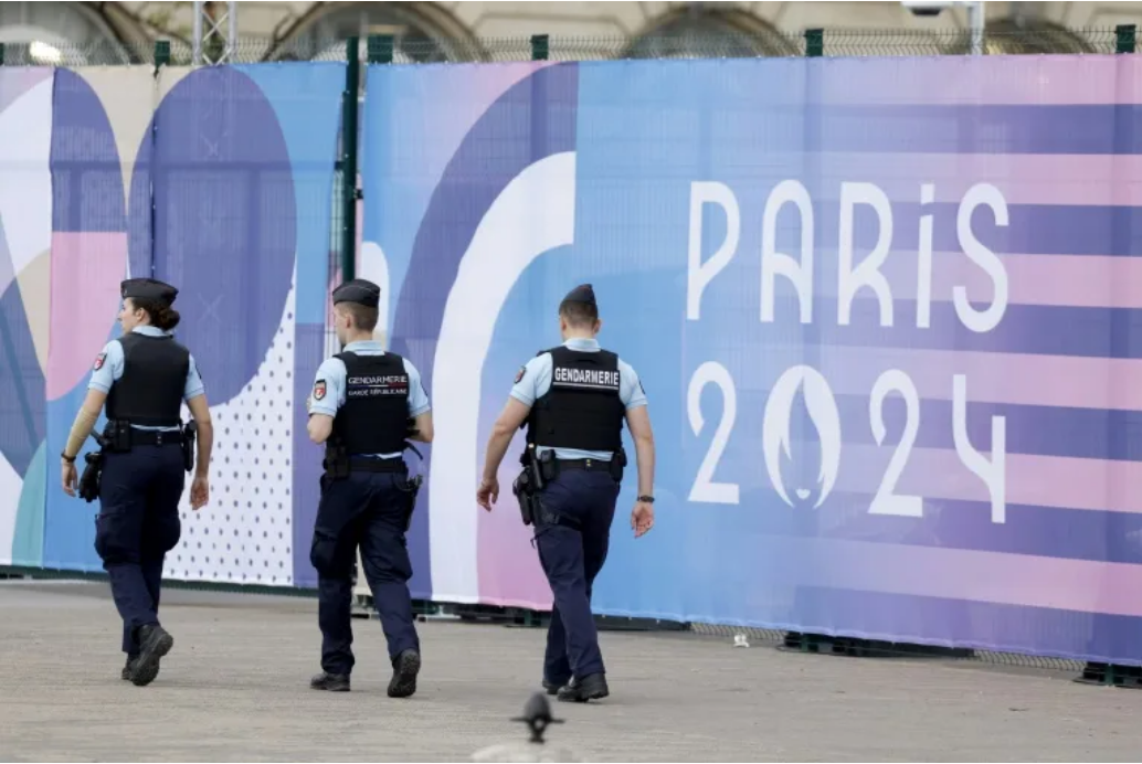 Central Paris locks down for Olympics as athletes arrive