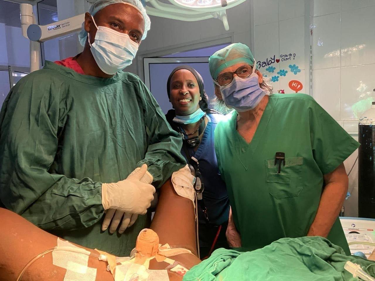 Italian doctor Roberto De Castro (R) and local surgeons during the reconstructive surgery for Ibrahim in Banjul, Gambia. Photo: Supplied