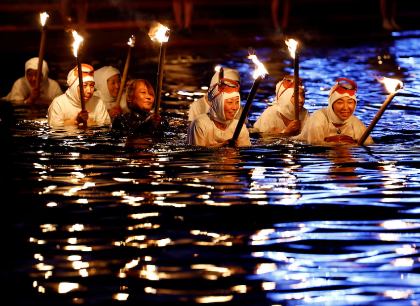 Short of female free divers, Japanese sea festival turns to volunteers