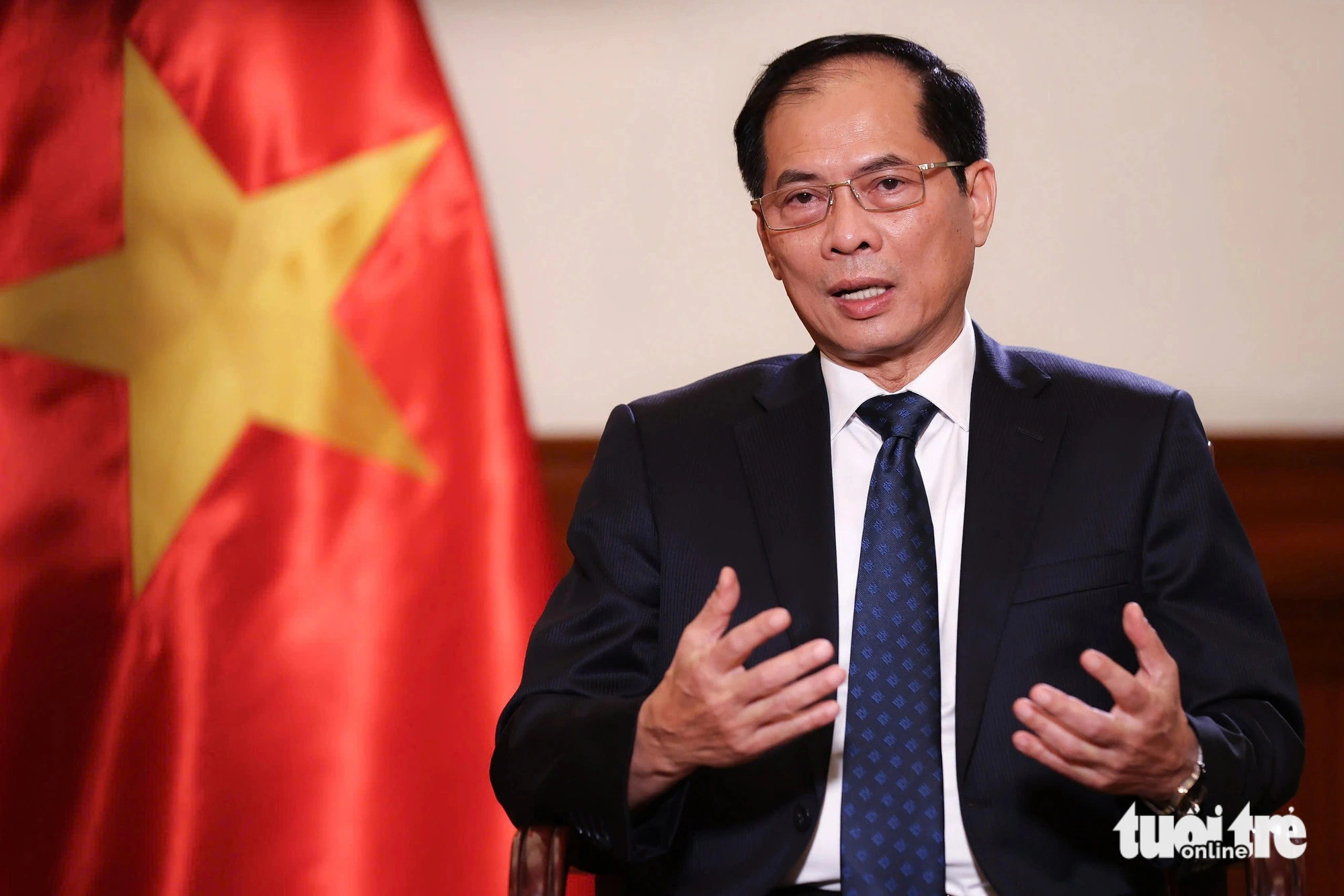 Vietnamese Minister of Foreign Affairs Bui Thanh Son gestures during an interview about General Secretary of the Communist Party of Vietnam Central Committee Nguyen Phu Trong’s imprints on the country’s diplomacy. Photo: Nguyen Khanh / Tuoi Tre