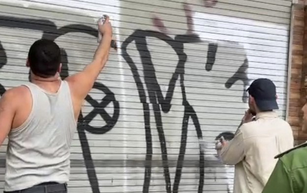 Ho Chi Minh City police deport 2 foreigners for scrawling graffiti on local properties