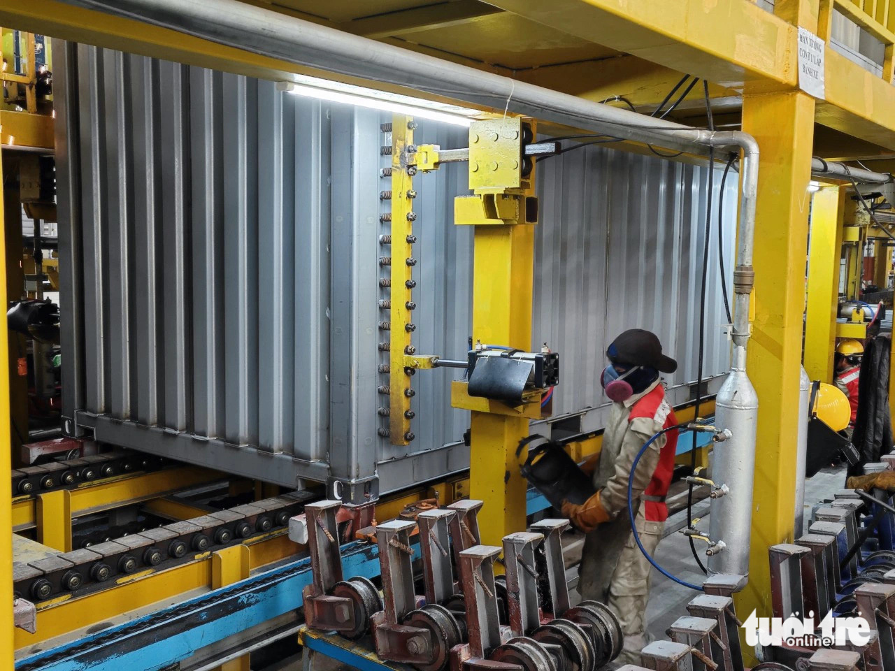 Workers at Hoa Phat Container Production’s container plant in southern Vietnam’s Ba Ria-Vung Tau Province. Photo: Cong Trung / Tuoi Tre