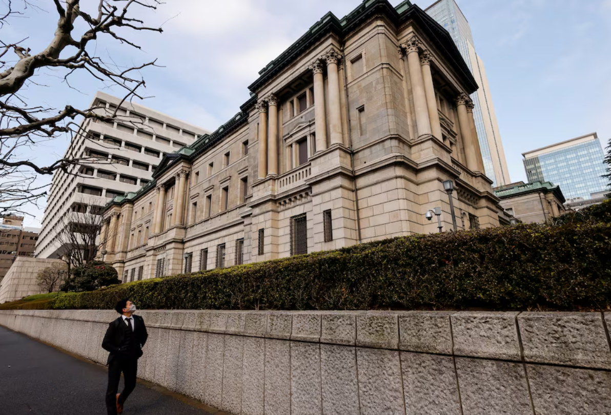 Bank of Japan raises interest rates, outlines bond taper plan