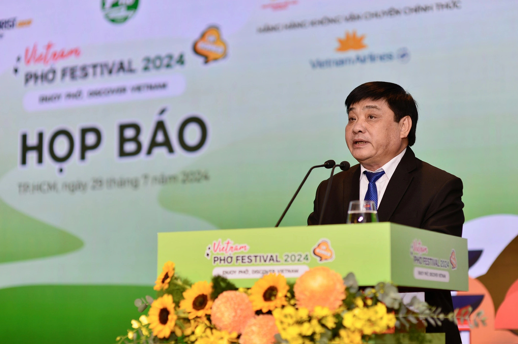 Le The Chu, Editor-in-Chief at Tuoi Tre (Youth) newspaper, delivers a speech at a press conference to announce the 'Vietnam Phở Festival 2024', Ho Chi Minh City, July 29, 2024. Photo: Quang Dinh / Tuoi Tre