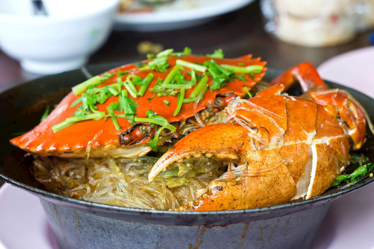 Stir-fried glass noodles with crab. Photo: Taste Atlas