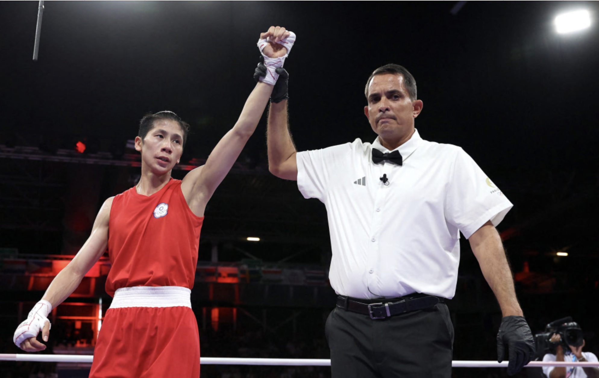 Match referee Emanuel Ferreira raises the hand of Lin Yu-ting of Taiwan during the Women's 57 kg preliminary round match at the Olympics in Paris on August 2, 2024. Photo: Getty Images