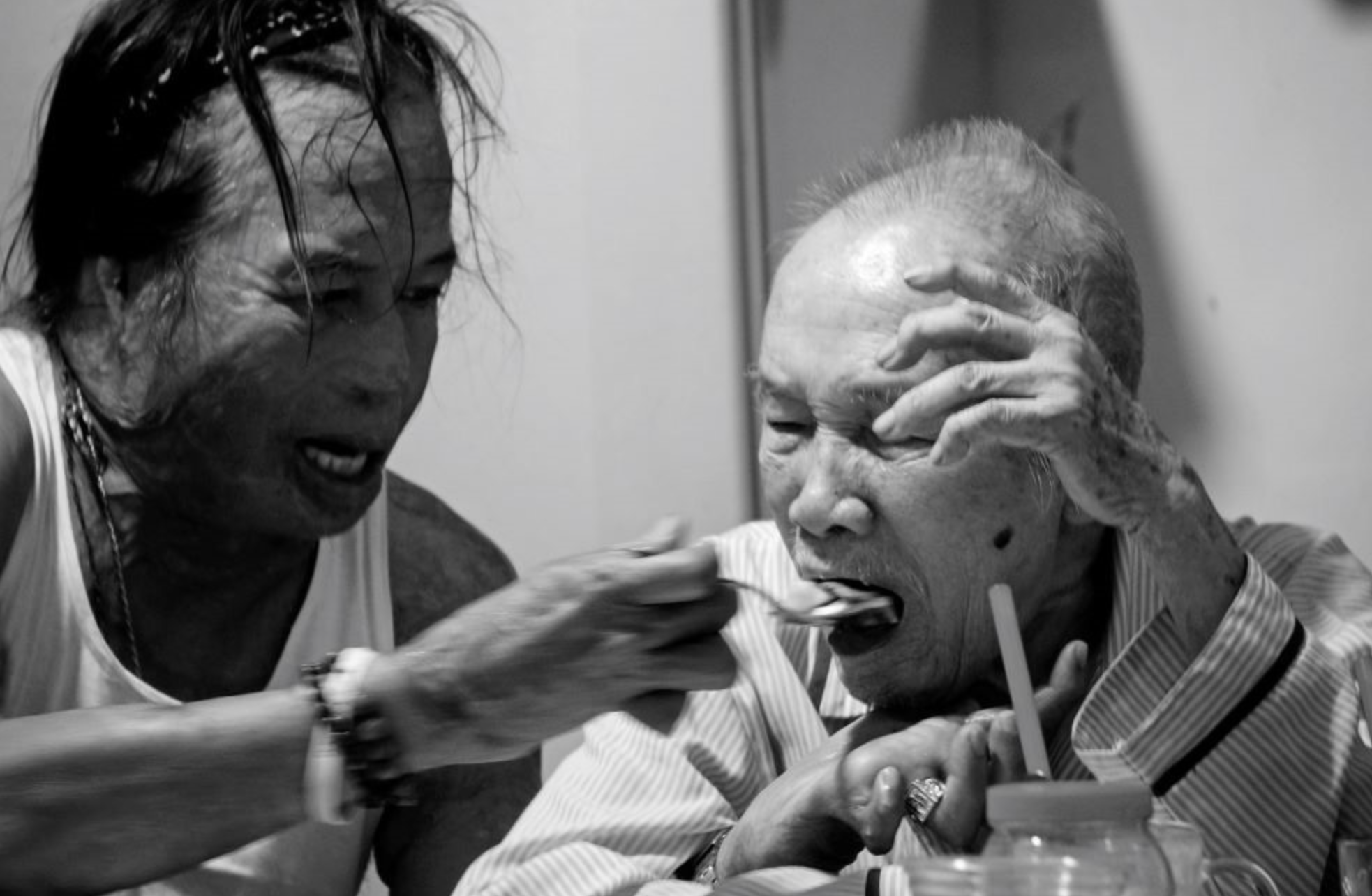 Photographer Nguyen Ba Han (L) pictured by his son - photographer Nguyen Ba Minh Hien.