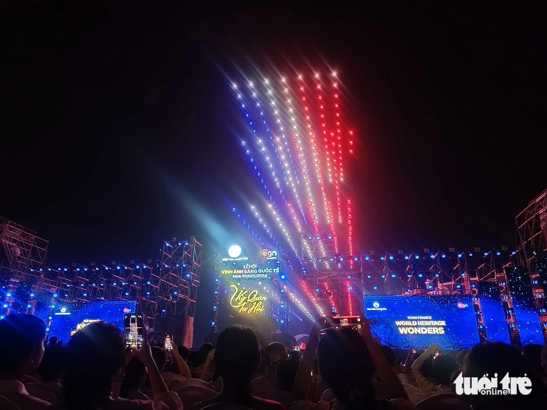 Colorful drones are seen flying into the sky during the French team's light show at the closing night of the Nha Trang International Light Bay Festival 2024 in Khanh Hoa Province, south-central Vietnam, August 3, 2024. Photo: Tran Hoai / Tuoi Tre