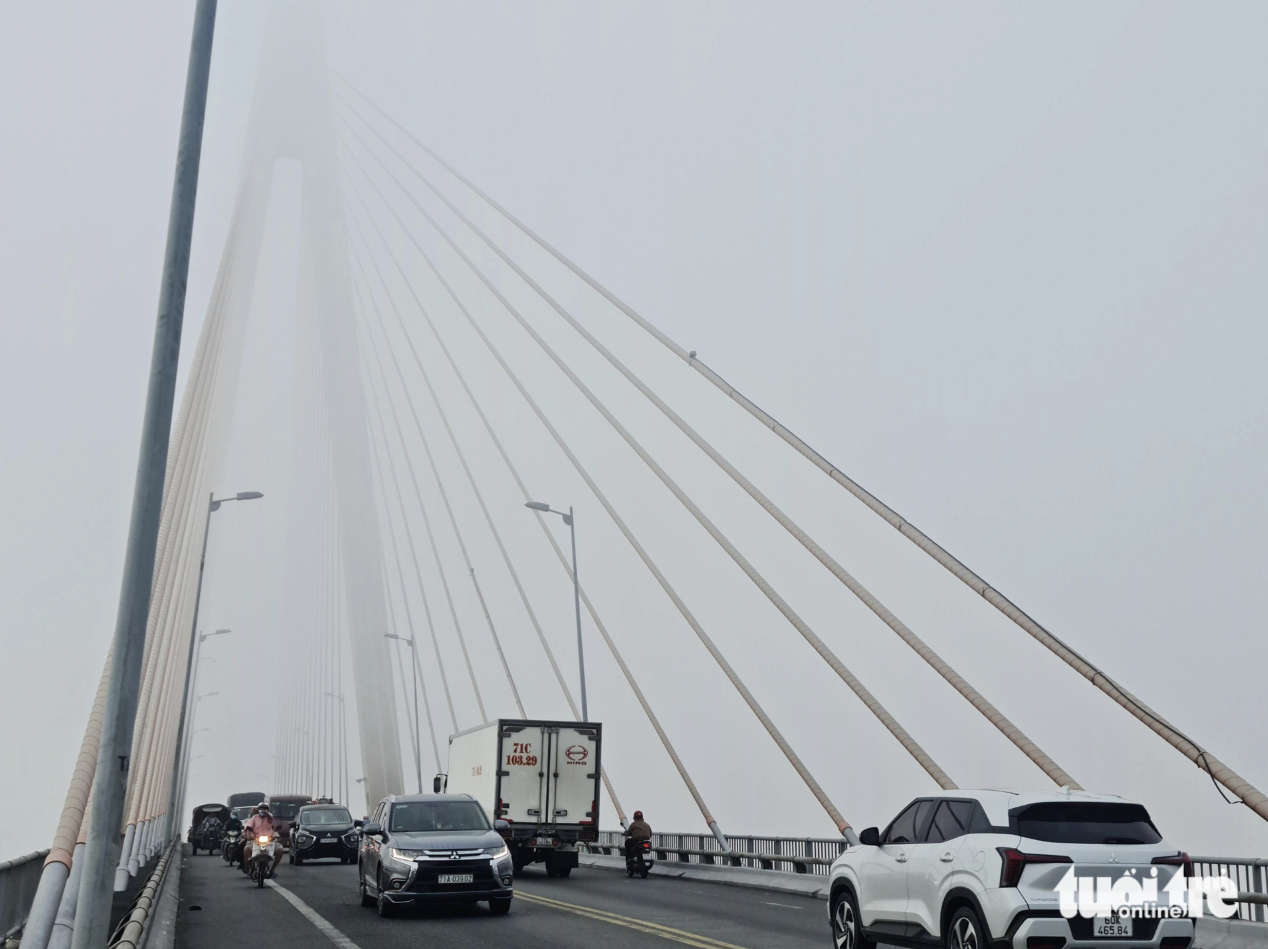 Rach Mieu Bridge blanketed in mist. Photo: Mau Truong / Tuoi Tre