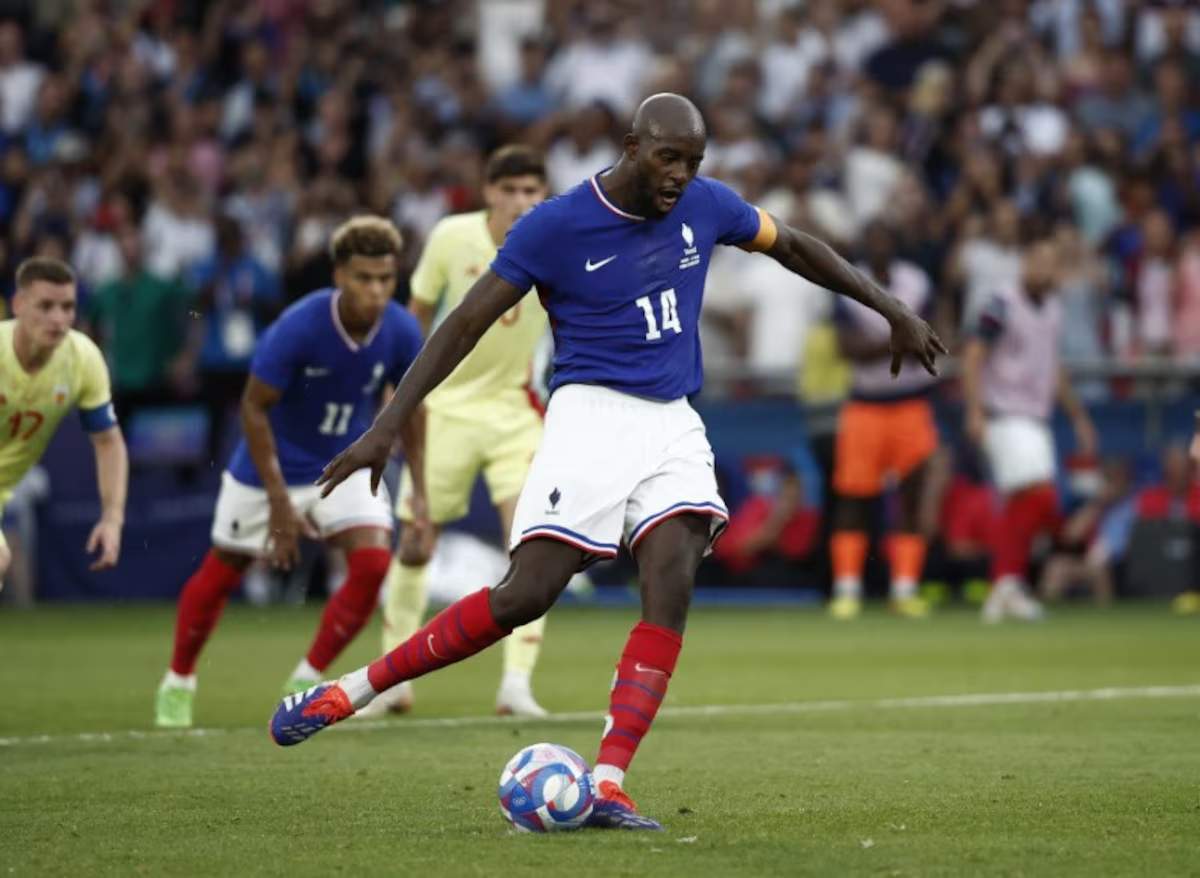 Paris 2024 Olympics - Football - Men's Gold Medal Match - France vs Spain - Parc des Princes, Paris, France - August 09, 2024. Jean-Philippe Mateta of France scores their third goal from a penalty. Photo: Reuters