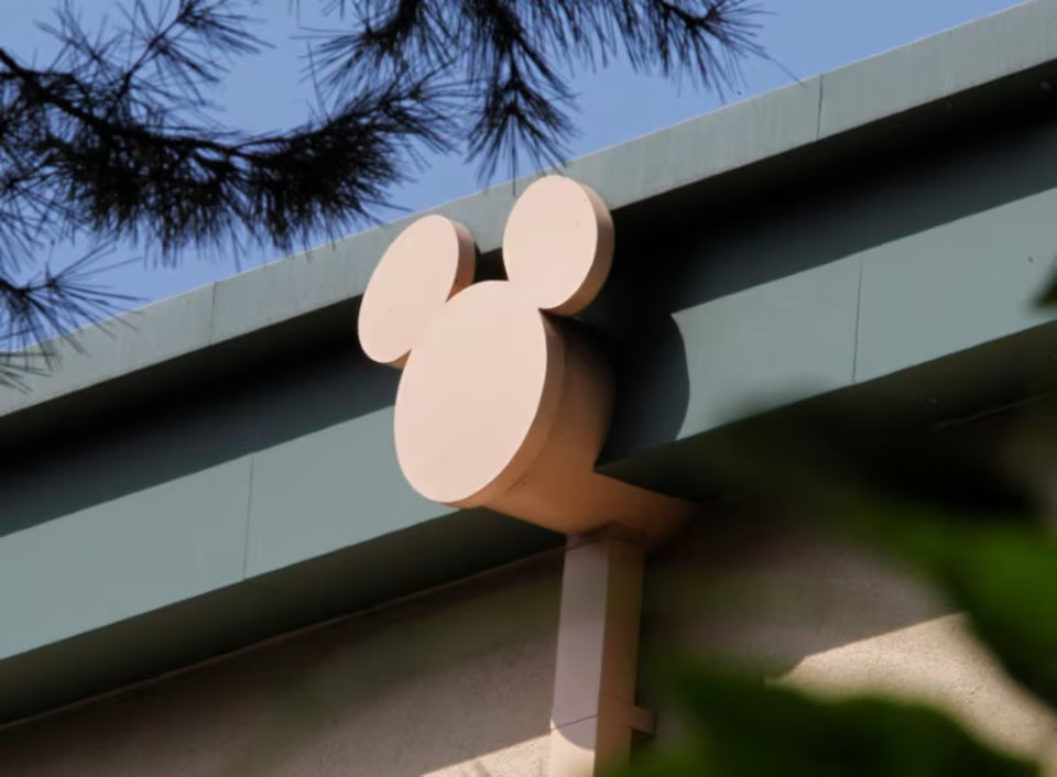 A rain spout stylized with the outline of Disney character Mickey Mouse is seen on a building at The Walt Disney Co. studios in Burbank, California August 9, 2011. Photo: Reuters