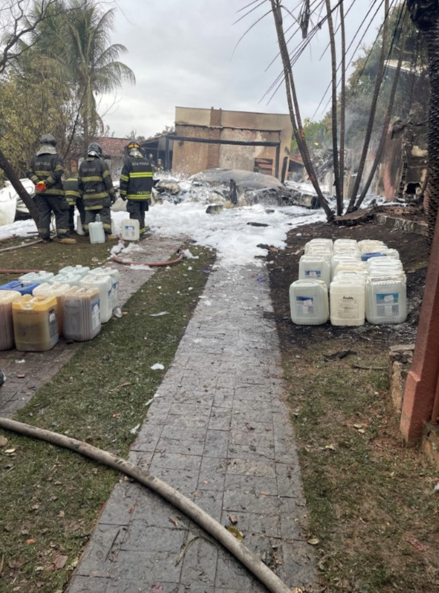 Debris is pictured as emergency personnel work at the site of a turboprop plane crash, in Vinhedo, Brazil August 9, 2024 in this picture obtained from social media. Photo: Reuters